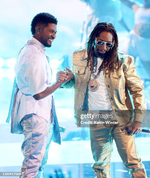 In this image released on May 27, Usher and Lil Jon perform onstage at the 2021 iHeartRadio Music Awards at The Dolby Theatre in Los Angeles,...