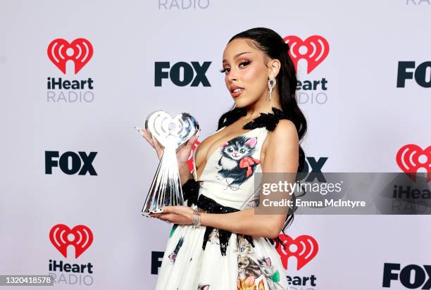 Doja Cat, winner of the Best New Pop Artist award, attends the 2021 iHeartRadio Music Awards at The Dolby Theatre in Los Angeles, California, which...