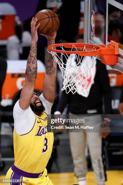 Anthony Davis of the Los Angeles Lakers dunks during the first half of Game Three of the Western Conference first-round playoff series against the...