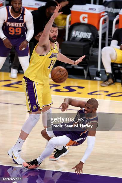 Marc Gasol of the Los Angeles Lakers fouls Chris Paul of the Phoenix Suns during the first half of Game Three of the Western Conference first-round...