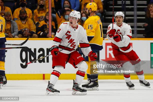Brock McGinn of the Carolina Hurricanes reacts after scoring a goal against the Nashville Predators during the first period in Game Six of the First...