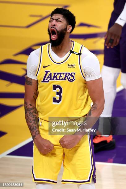 Anthony Davis of the Los Angeles Lakers reacts after scoring during the second half of Game Three of the Western Conference first-round playoff...