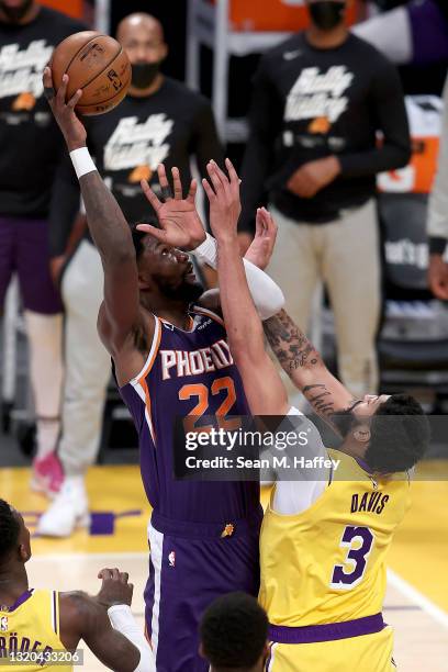 Deandre Ayton of the Phoenix Suns shoots over the defense of Anthony Davis of the Los Angeles Lakers during the second half of Game Three of the...