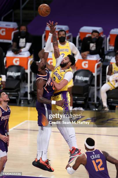 Anthony Davis of the Los Angeles Lakers shoots over the defense of Deandre Ayton of the Phoenix Suns during the second half of Game Three of the...