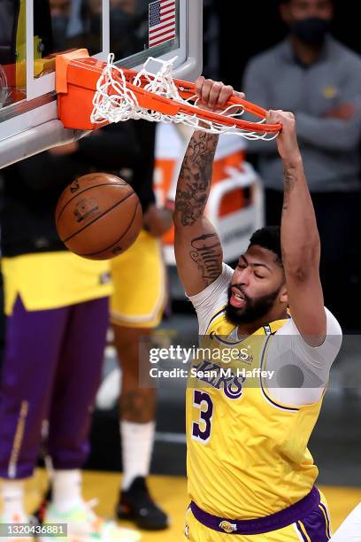 Anthony Davis of the Los Angeles Lakers dunks the ball during the second half of Game Three of the Western Conference first-round playoff series...