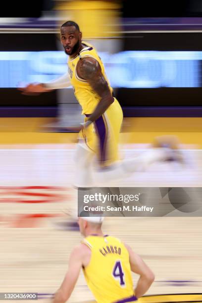LeBron James of the Los Angeles Lakers runs upcourt during the second half of Game Three of the Western Conference first-round playoff series against...