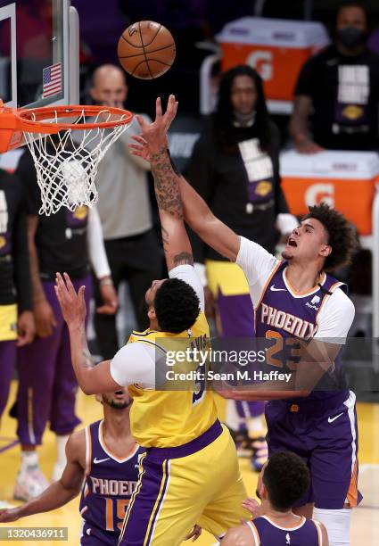 Anthony Davis of the Los Angeles Lakers shoots past the defense of Cameron Johnson of the Phoenix Suns during the second half of Game Three of the...