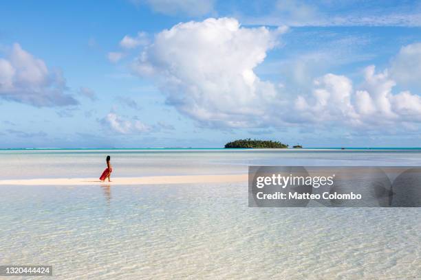 beautiful woman in aitutaki lagoon, cook islands - south pacific stock pictures, royalty-free photos & images