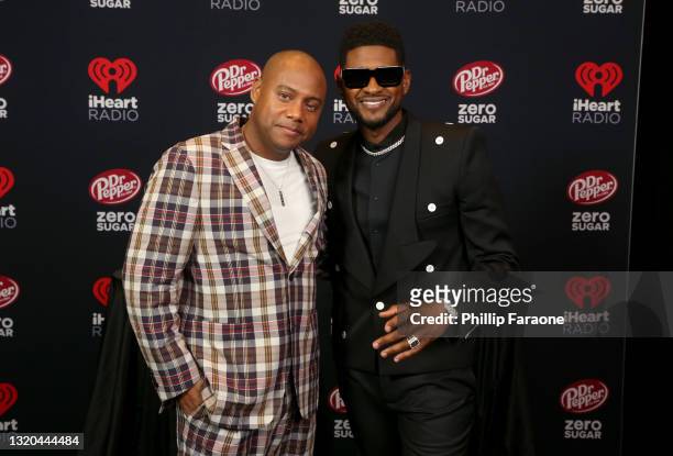 Maxwell and host Usher attend the 2021 iHeartRadio Music Awards at The Dolby Theatre in Los Angeles, California, which was broadcast live on FOX on...