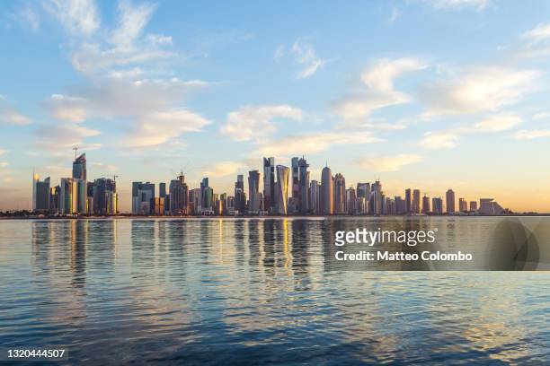 doha financial district at sunset, qatar - ad dawhah stock pictures, royalty-free photos & images