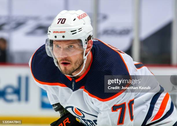 Dmitry Kulikov of the Edmonton Oilers prepares for a second period face-off against the Winnipeg Jets in Game Three of the First Round of the 2021...