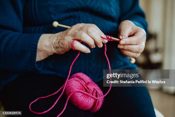 senior hands knitting - rheumatism stock pictures, royalty-free photos & images