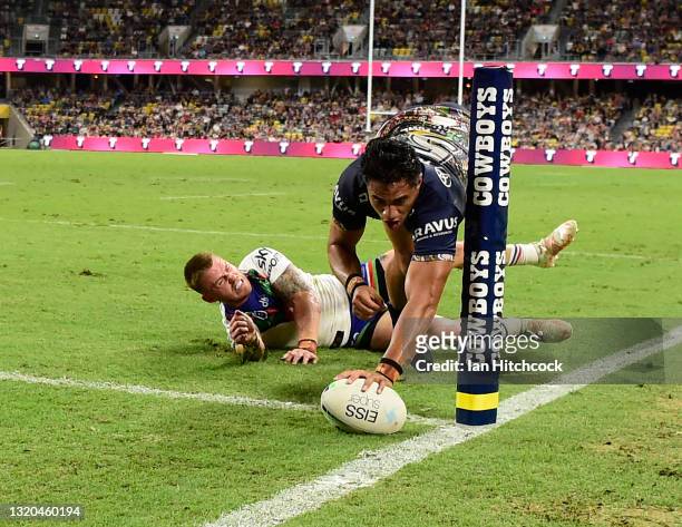 Murray Taulagi of the Cowboys scores a try during the round 12 NRL match between the North Queensland Cowboys and the New Zealand Warriors at QCB...