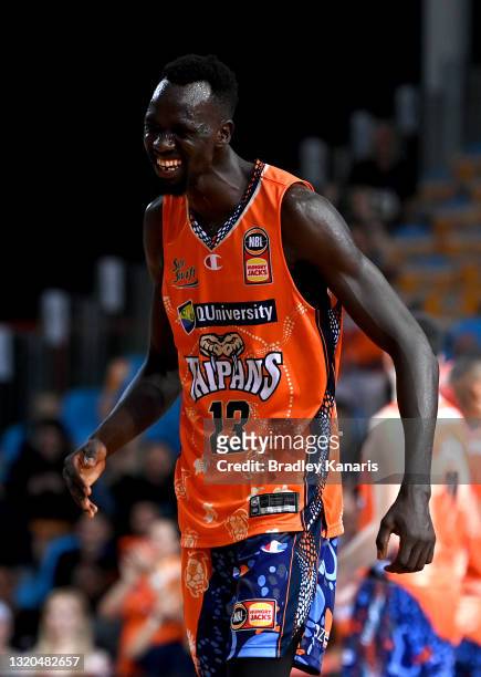 Majok Deng of the Taipans celebrates during the round 20 NBL match between South East Melbourne Phoenix and Cairns Taipans at Cairns Pop Up Arena, on...