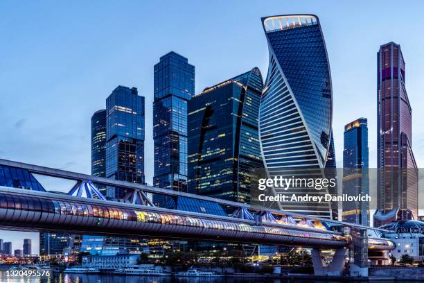 moscow skyscrapers panorama in the evening. - moscow stock pictures, royalty-free photos & images