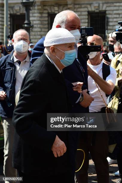 Husband of Carla Fracci, Beppe Menegatti and his son Francesco Menegatti attend the burial chamber of dancer Carla Fracci at Teatro Alla Scala on May...