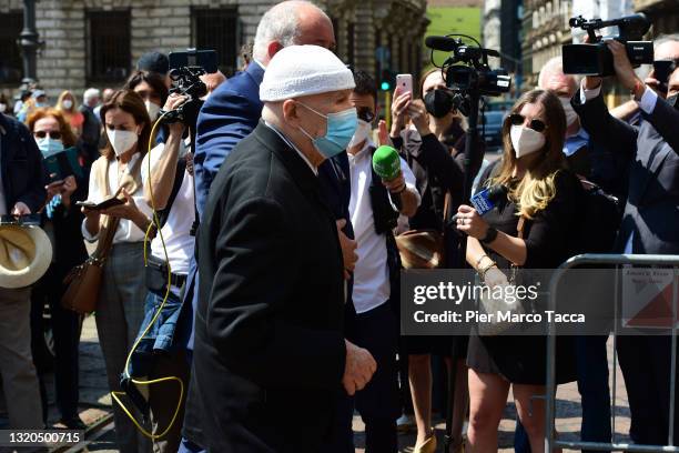 Husband of Carla Fracci, Beppe Menegatti and his son Francesco Menegatti attend the burial chamber of dancer Carla Fracci at Teatro Alla Scala on May...