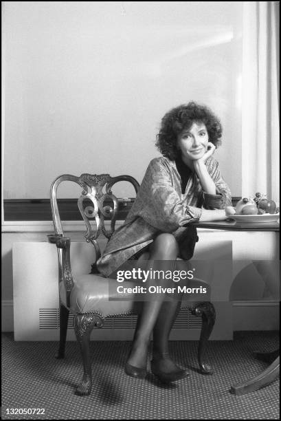 Portrait of American actress Mary Steenburgen as she sits at a table, New York, New York, mid 1980s.