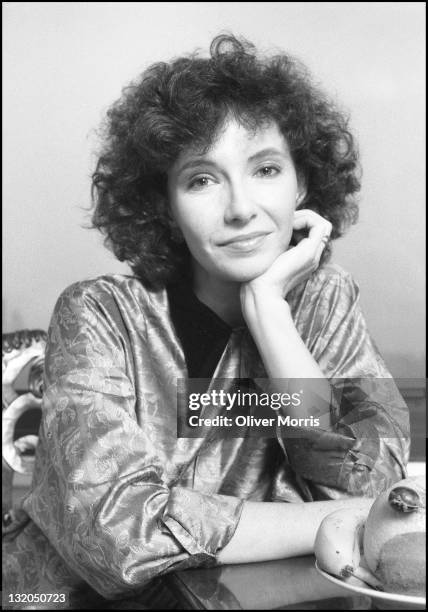 Portrait of American actress Mary Steenburgen as she sits at a table, New York, New York, mid 1980s.
