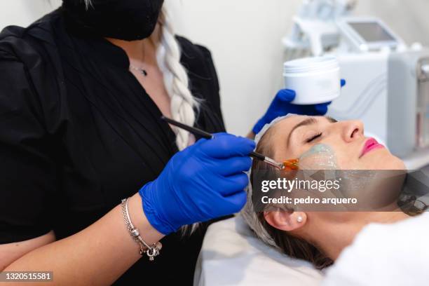 chemical peeling beauty treatment - peel stock pictures, royalty-free photos & images