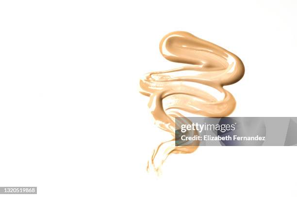 smear of the foundation - cosmetics cream stock pictures, royalty-free photos & images