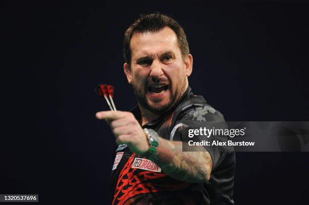 Jonny Clayton of Wales celebrates in his Semi-Final match against Michael van Gerwen of The Netherlands during Night 17 of the Unibet Premier League...