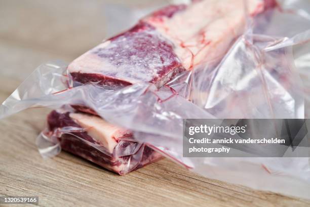 vacuum-sealed short ribs - sous vide stock pictures, royalty-free photos & images