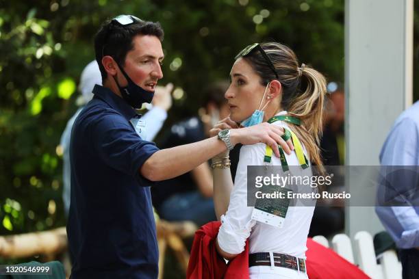 Lorenzo De Luca and Jessica Springsteen are seen during the CSIO Rome Piazza Di Siena International Equestrian Competition at Piazza Di Siena on May...