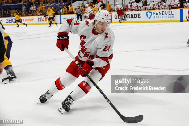 Jake Bean of the Carolina Hurricanes skates against the Nashville Predators during the third period in Game Six of the First Round of the 2021...