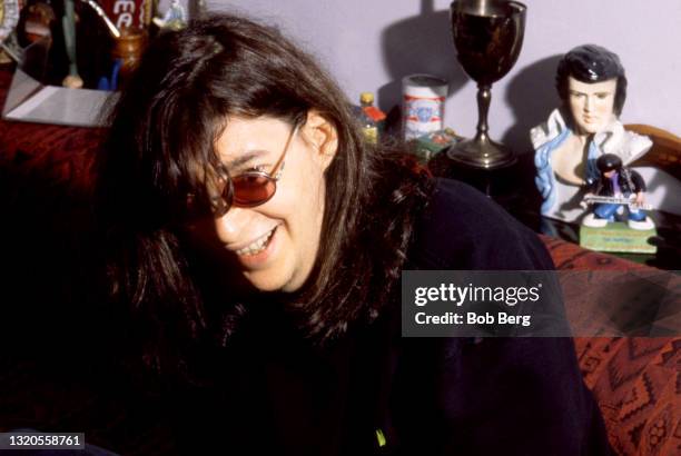 American musician, singer, composer, and lead vocalist Joey Ramone poses for a portrait circa April, 1997 at Joey Ramone's East Village apartment in...