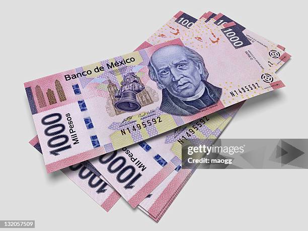 some bills of one thousand mexican pesos - 1000 stock pictures, royalty-free photos & images