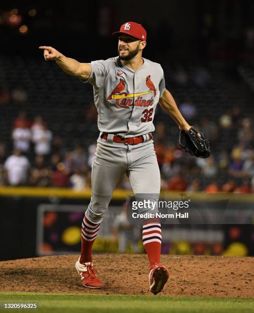 Daniel Ponce de Leon of the St Louis Cardinals celebrates an 8-6 win against the Arizona Diamondbacks at Chase Field on May 28, 2021 in Phoenix,...