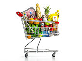 Shopping cart full of food isolated on white. Grocery and food store concept.