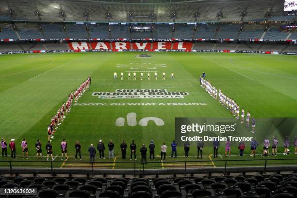 Layers line up for the acknowledgement of country before the round 11 AFL match between the St Kilda Saints and the North Melbourne Kangaroos at...