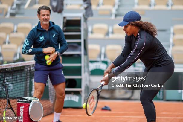 May 29. Serena Williams of the United States practicing with coach Patrick Mouratoglou while training on Court Philippe-Chatrier in preparation for...