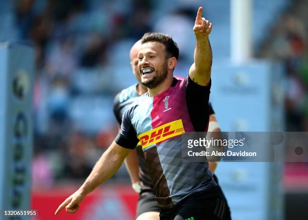 Danny Care of Harlequins celebrates after scoring his side's second try during the Gallagher Premiership Rugby match between Harlequins and Bath at...