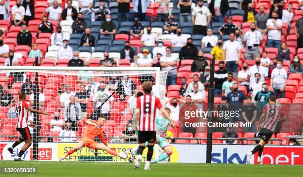 Emiliano Marcondes of Brentford scores his team's second goal during the Sky Bet Championship Play-off Final between Brentford FC and Swansea City at...