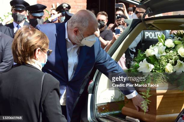 Francesco Menegatti touches the coffin during the funeral of dancer Carla Fracci at Chiesa di San Marco on May 29, 2021 in Milan, Italy. The...