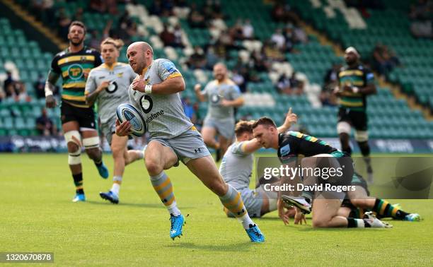 Dan Robson of Wasps breaks clear to score their first try during the Gallagher Premiership Rugby match between Northampton Saints and Wasps at...