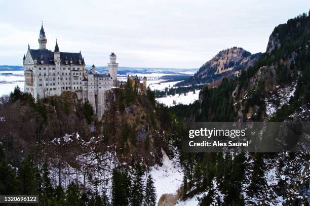 füssen (bavaria), germany - february 2011: neuschwanstein castle, view from mary bridge - neuschwanstein winter stock pictures, royalty-free photos & images