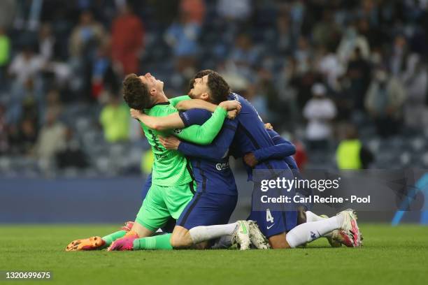 Kepa Arrizabalaga, Jorginho and Andreas Christensen of Chelsea celebrate following their side's victory in the UEFA Champions League Final between...