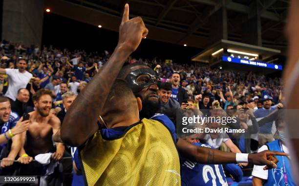 Antonio Ruediger, Hakim Ziyech and Callum Hudson-Odoi of Chelsea celebrate with fans following victory during the UEFA Champions League Final between...
