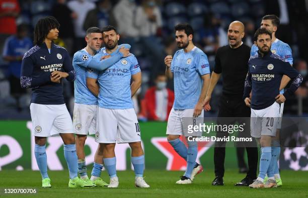 Phil Foden of Manchester City consoles teammate Sergio Aguero after defeat during the UEFA Champions League Final between Manchester City and Chelsea...