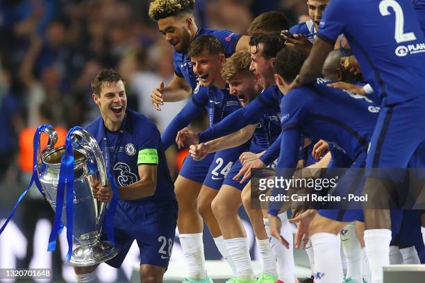 Cesar Azpilicueta of Chelsea prepares to lift the Champions League Trophy following their team's victory during the UEFA Champions League Final...