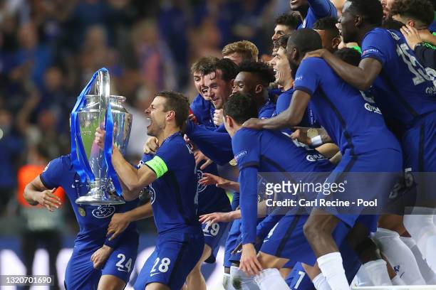 Cesar Azpilicueta of Chelsea lifts the Champions League Trophy following their team's victory during the UEFA Champions League Final between...