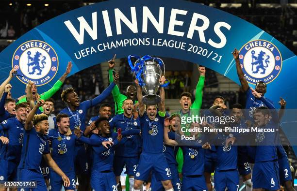 Cesar Azpilicueta of Chelsea lifts the Champions League Trophy following their team's victory in the UEFA Champions League Final between Manchester...