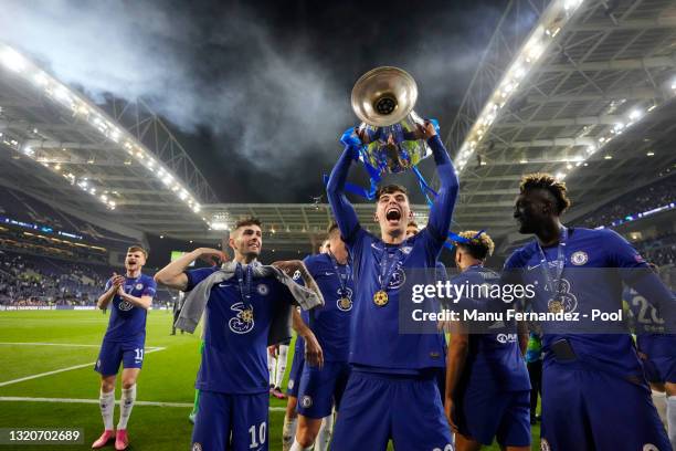 Kai Havertz of Chelsea celebrates with the Champions League Trophy following their team's victory during the UEFA Champions League Final between...