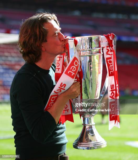 Thomas Frank manager of Brentford kisses the trophy after winning the Sky Bet Championship Play-off Final between Brentford FC and Swansea City at...