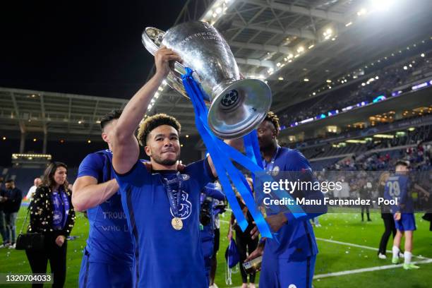 Reece James of Chelsea celebrates with the Champions League Trophy following their team's victory in the UEFA Champions League Final between...