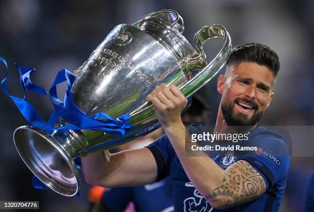 Olivier Giroud of Chelsea celebrates with the Champions League Trophy following their team's victory in the UEFA Champions League Final between...